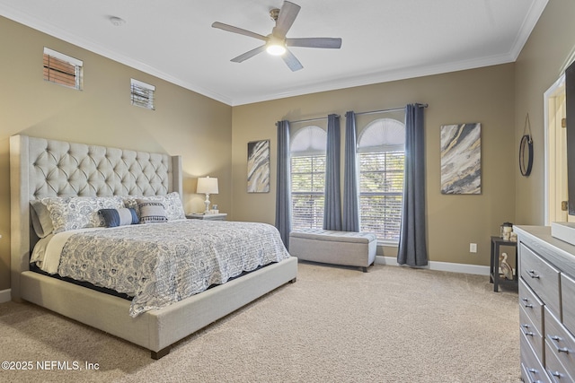 carpeted bedroom with crown molding and ceiling fan