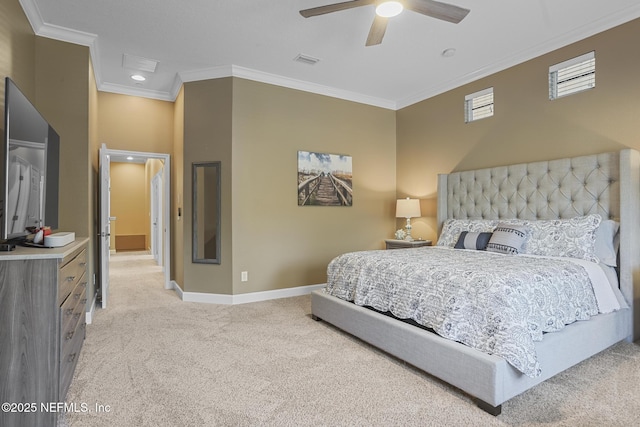 carpeted bedroom featuring ceiling fan and ornamental molding