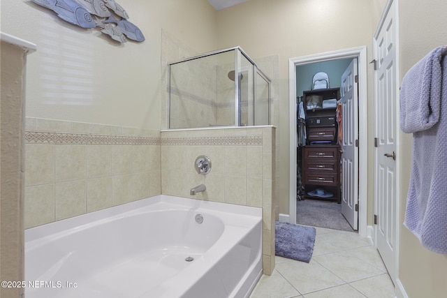 bathroom featuring tile patterned flooring and plus walk in shower