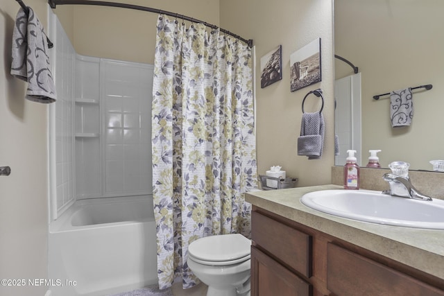 full bathroom with vanity, toilet, and shower / bath combo with shower curtain