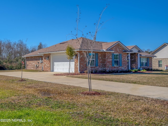 single story home with a garage and a front yard