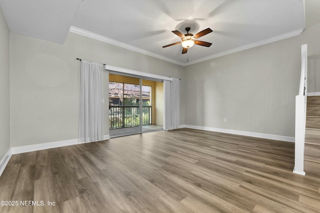 unfurnished living room featuring ceiling fan, ornamental molding, and hardwood / wood-style floors