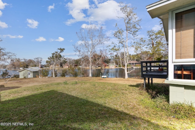 view of yard with a water view