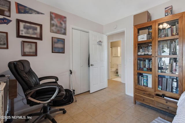 home office featuring light tile patterned floors