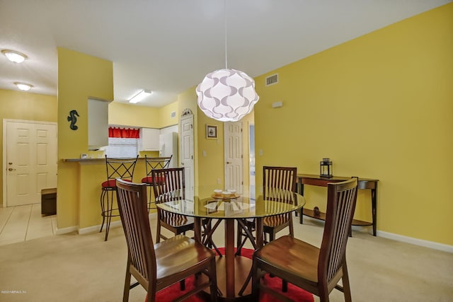 view of carpeted dining room