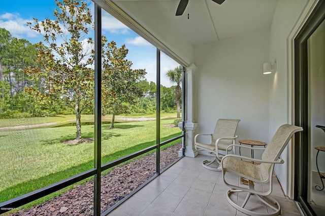 sunroom / solarium with ceiling fan