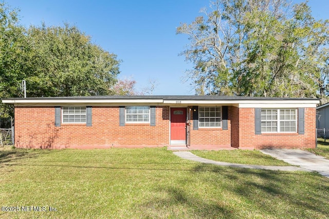 single story home featuring a front yard