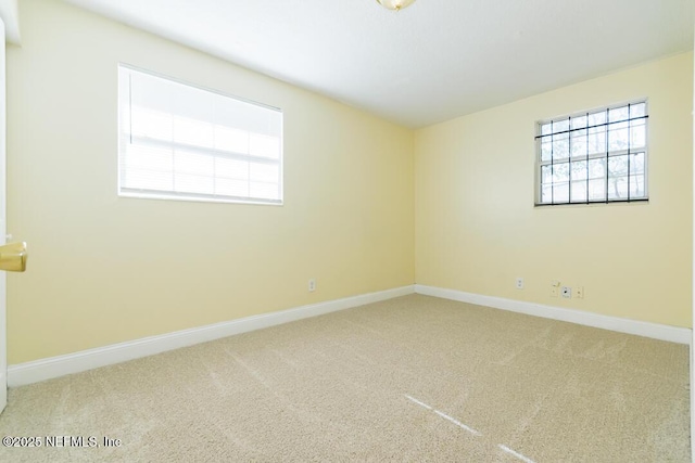 view of carpeted spare room