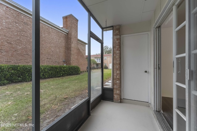 unfurnished sunroom with plenty of natural light