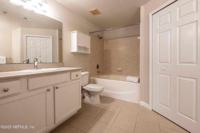 bathroom with tile patterned floors, visible vents, toilet, and vanity