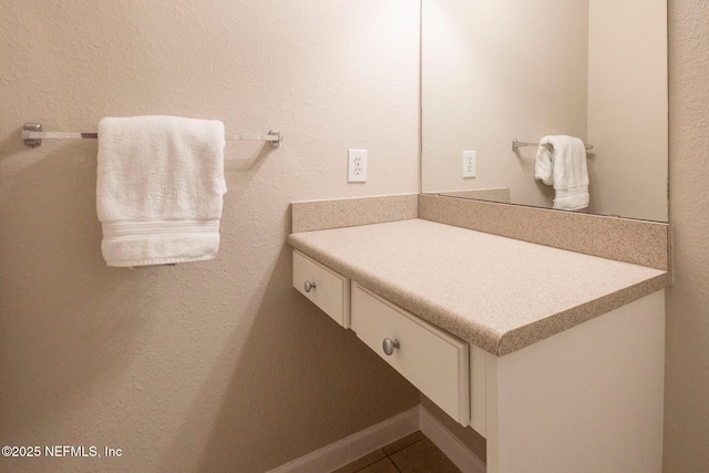 bathroom featuring vanity and tile patterned flooring