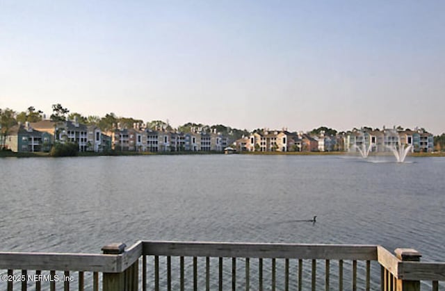 view of water feature with a residential view