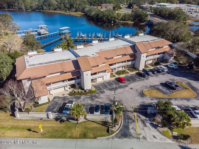 drone / aerial view featuring a water view