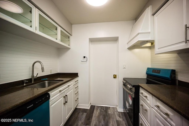 kitchen with sink, range with electric stovetop, white cabinets, and dishwashing machine