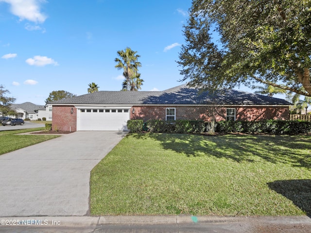 single story home with a garage and a front yard