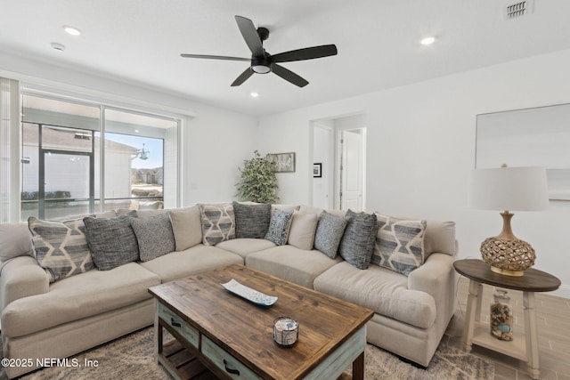 living room featuring ceiling fan