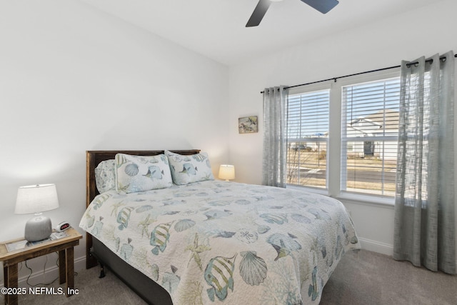 bedroom featuring ceiling fan and carpet floors