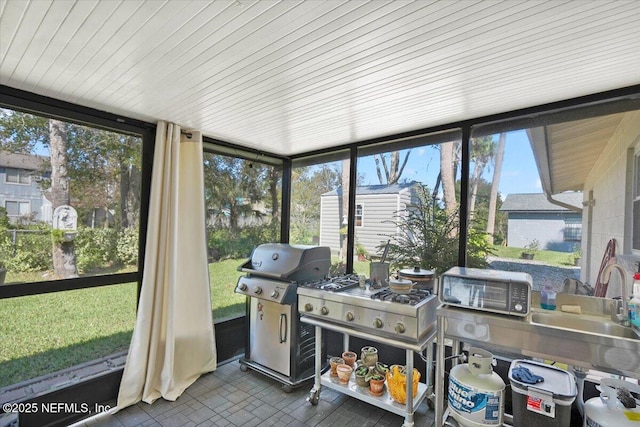 sunroom with sink