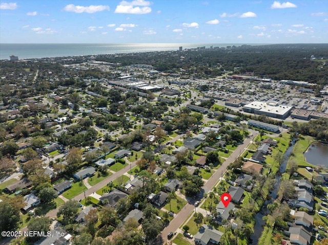 drone / aerial view with a water view