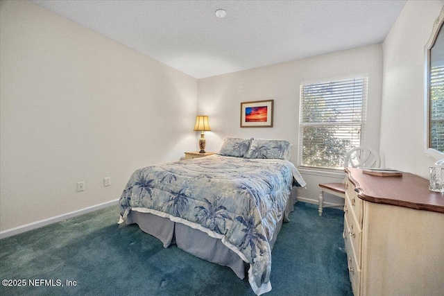 bedroom featuring dark colored carpet