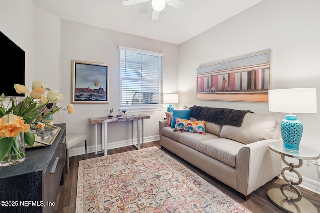 living room with hardwood / wood-style flooring and ceiling fan