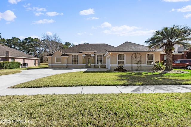 ranch-style house featuring a front yard