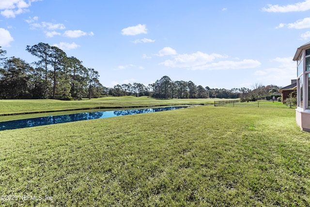 view of yard featuring a water view