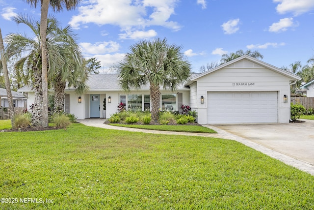 ranch-style house featuring a garage and a front yard