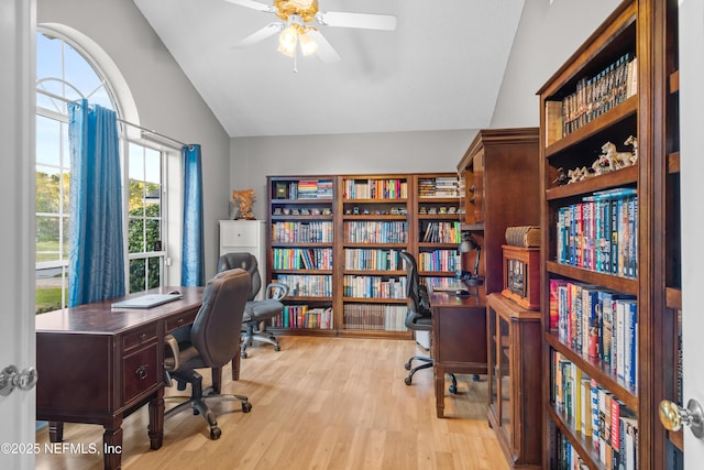 office space with ceiling fan, light hardwood / wood-style flooring, and lofted ceiling