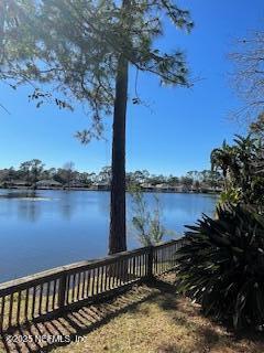 exterior space with a water view