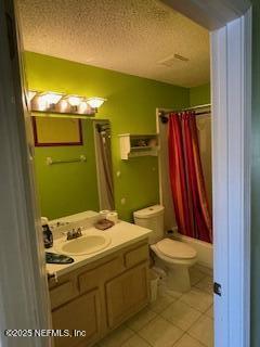 full bathroom featuring shower / bathtub combination with curtain, vanity, a textured ceiling, tile patterned floors, and toilet