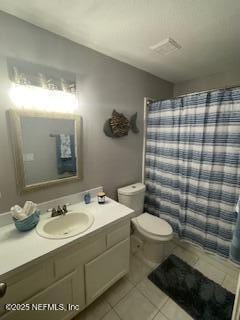 3706 Sanctuary Way N, Jacksonville Beach, FL 32250 - bathroom featuring vanity, tile patterned flooring, toilet, and a shower with shower curtain
