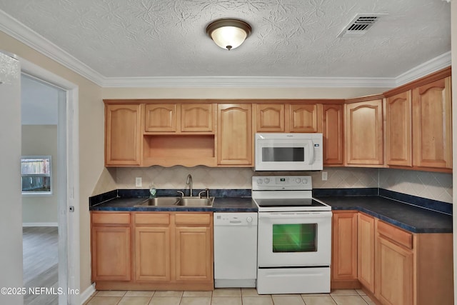 kitchen with white appliances, sink, backsplash, ornamental molding, and light tile patterned floors