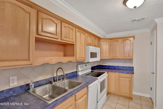 kitchen with sink, white appliances, light brown cabinets, and light tile patterned flooring