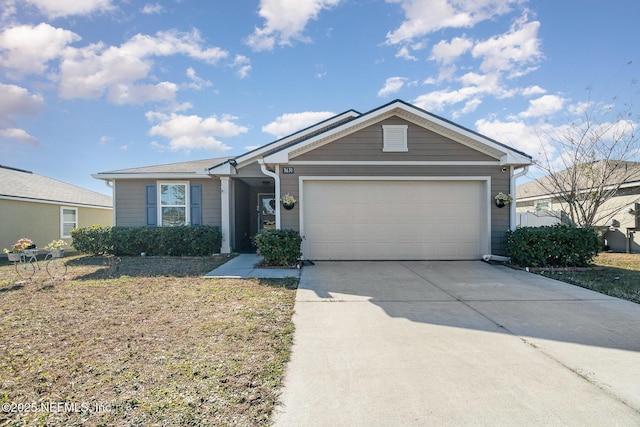 ranch-style house featuring a garage