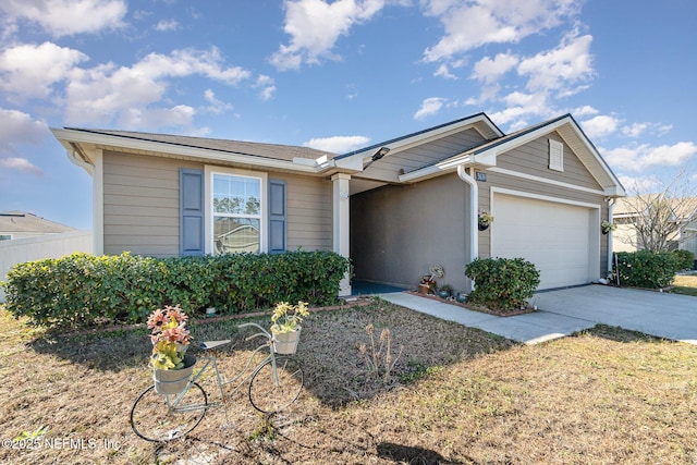 ranch-style home with a garage