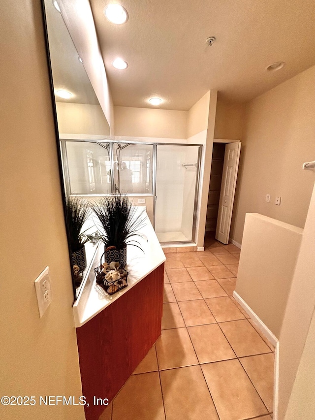 bathroom featuring tile patterned flooring