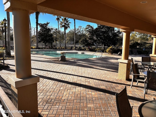 view of pool featuring a patio area