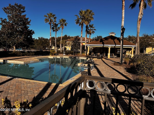 view of swimming pool with a gazebo