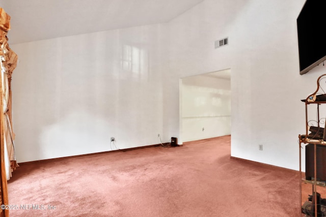 unfurnished living room with carpet floors