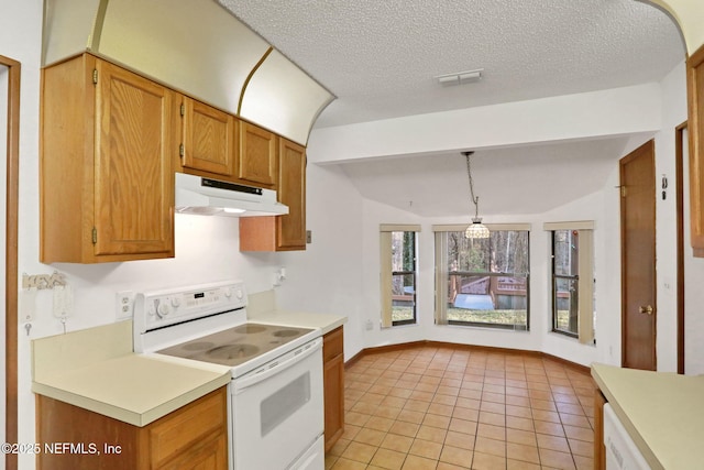 kitchen featuring light tile patterned flooring, electric range, a textured ceiling, and decorative light fixtures