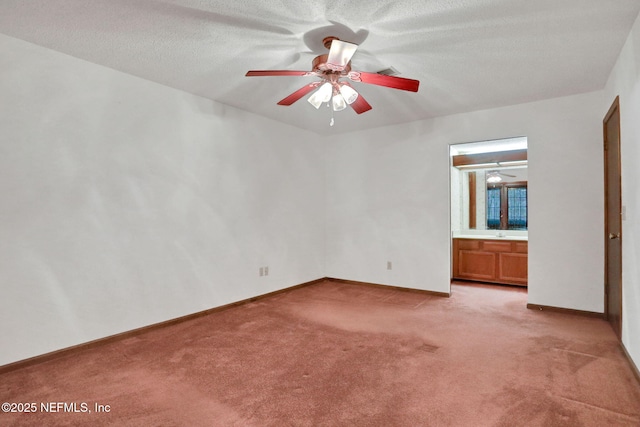 interior space featuring a textured ceiling and ceiling fan