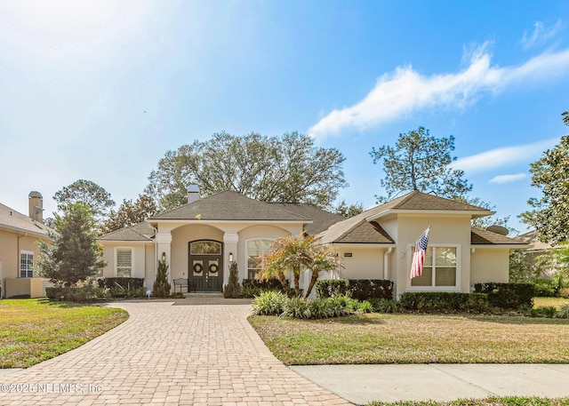 view of front of property with a front yard