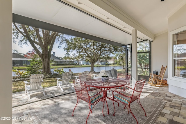 view of patio / terrace with a water view