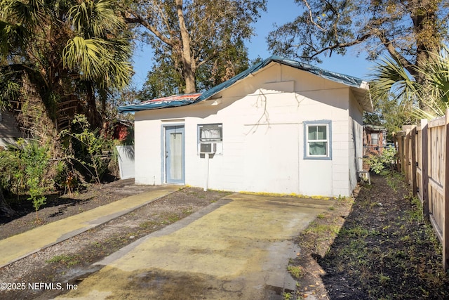 view of outbuilding with cooling unit