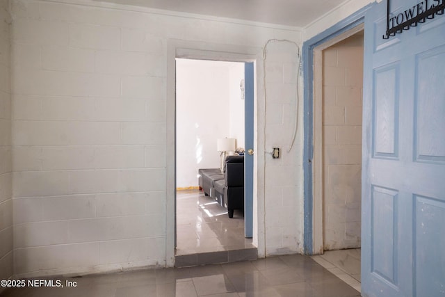 hall featuring tile patterned flooring