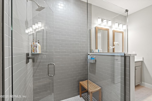 bathroom featuring vanity and walk in shower