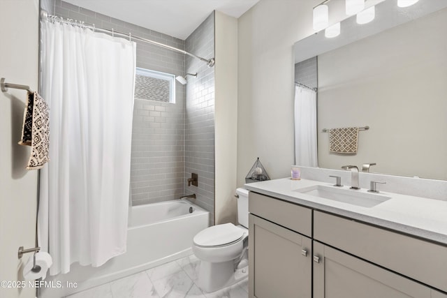 full bathroom with vanity, shower / tub combo, and toilet