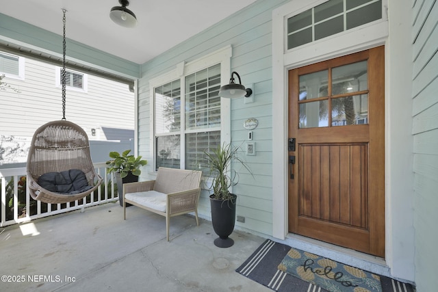 entrance to property with covered porch