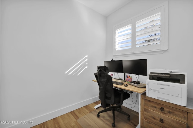 home office featuring hardwood / wood-style floors